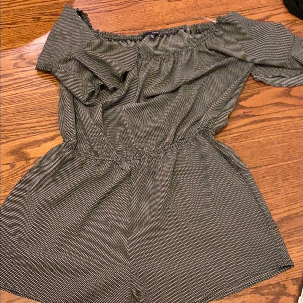 Black and white polka dot romper w/ ruffle sleeves